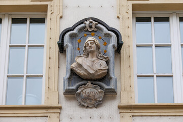 Religious Madonna Relief on Historic Building Facade Germany Augsburg 10.02.2025
