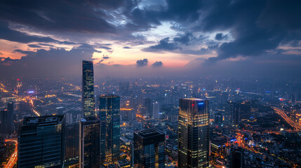 Fototapeta premium Breathtaking aerial view of a modern city skyline at dusk with illuminated skyscrapers, perfect for business, urban development, and futuristic themes