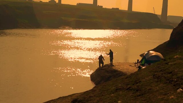 n experienced fisher attempting to catch fish with professional spinnng rod