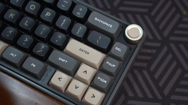 Hand Press Enter button on Black Computer Keyboard