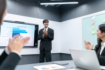 Businessman, woman and man presenting, office meeting with documents, laptop, sales planning, digital marketing and growth strategy, analysis with colorful charts and graphs about sales planning.