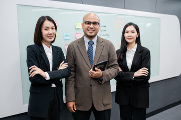 Businessman, woman, taking photo, looking at camera, smiling, holding laptop, planning sales, digital marketing, growth strategy, analysis with colorful charts and graphs.