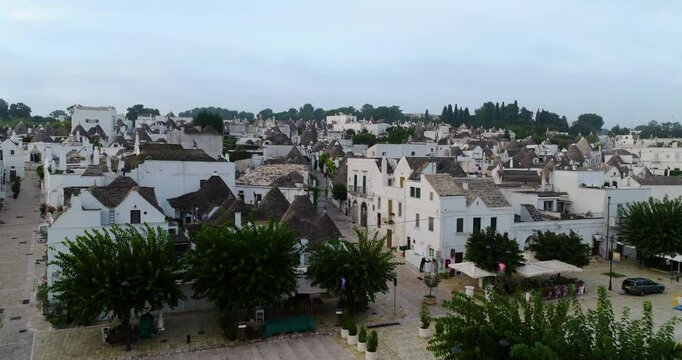 Unesco World Heritage Site - Traditional Stone Dwelling With Cone-shaped Roof In Alberobello, Italy. Aerial Drone Shot