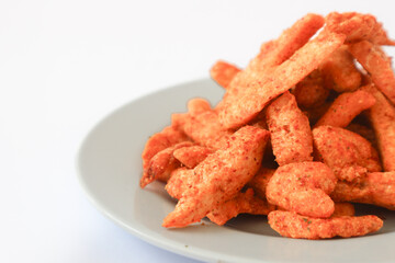 Spicy Basreng or fried meatball. Basreng is a typical snack from Sunda, Indonesia, made from fish balls which are thinly sliced ​​and then fried.