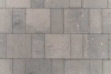 abstract background of old dirty tiles on the track in the park