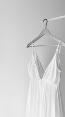 Delicate White Dress on Hanger - Simple Elegance