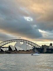 Naklejka premium sydney harbour bridge at sunset