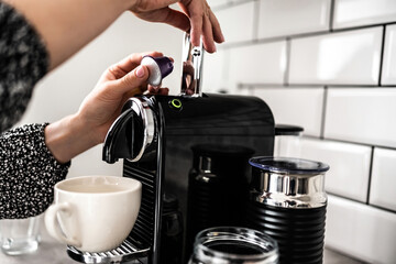 Capsule coffee machine at domestic kitchen