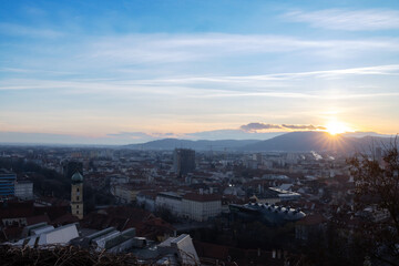 Sunset view of Graz in the evening from Schlossberg hill