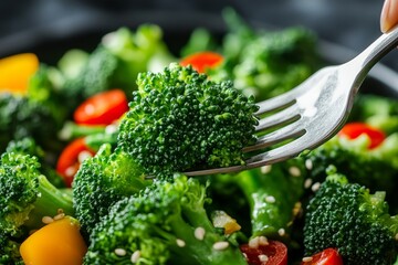Diet, Dieting asian young woman or girl use fork at broccoli on mix vegetables, green salad bowl, eat food is low fat good health. Nutritionist female, Weight loss for healthy