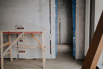 Unfinished Interior with Electrical Wiring and Construction Materials