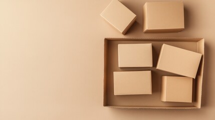 Cardboard boxes in a larger box on beige background; packaging, shipping, delivery concept