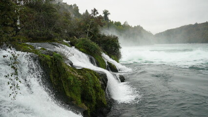 The 4k video captures the powerful Rhine Falls in Switzerland, as viewed from a boat cruising on the river with the flag of Switzerland.
Description : Rheinfall, Switzerland - October 20, 2024