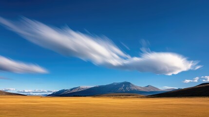 Dramatic long exposure of moving clouds over landscape