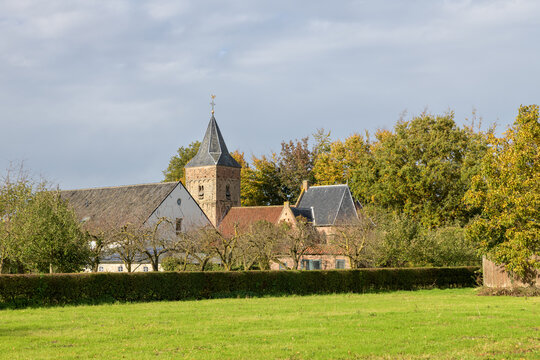 The small village Ressen with its historic protestant church  in the Betuwe in the province of Gelderland, the Netherlands.