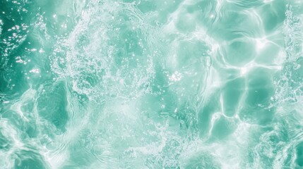 Obraz premium An abstract view of a turquoise water surface, featuring gentle ripples and soft reflections, evoking a sense of calmness and tranquility in nature's beauty.
