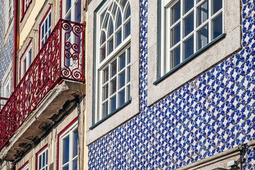 Close-up of a facade in Porto covered with traditional ceramic tiles (azulejos)