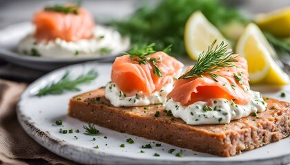 Traditional homemade smoked salmon pate with cream cheese, dill, chives and lemon