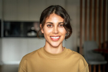 Headshot closeup portrait of young smiling latin freelance businesswoman, entrepreneur coder...