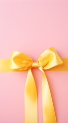 Elegant Gold Satin Ribbon Bow on Pink Background Festive Gift Wrap Birthday Celebration Decor