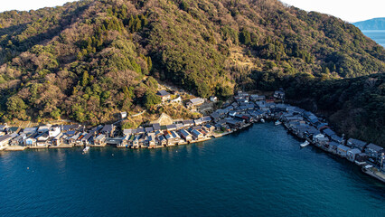 Obraz premium Aerial View of Traditional Funaya Boathouses in Ine Bay, Kyoto