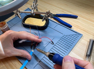 Soldering Electronics with Precision Tools 
