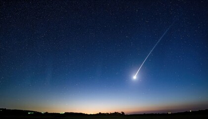 Bright comet streaks through starry night sky