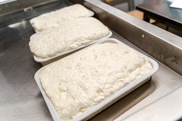 Maturation of Italian mozzarella cheese. Close-up