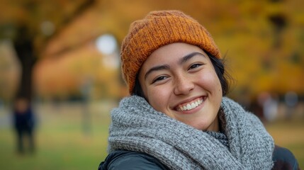 Joyful Nonbinary Individual Embracing Nature in Autumn Park with Warm Colors