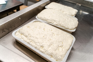 Maturation of Italian mozzarella cheese. Close-up