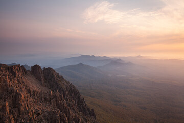Mt. Field National Park in Tasmanien. Mount Field West. Lookout to the West of Tasmanian Wilderness. Sunset and smoke in the air from the bushfire 2019.