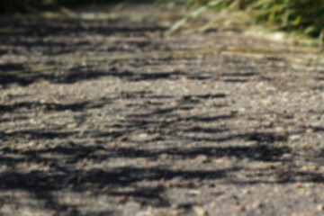 Rocky soil. Top view of rocky stone terrain. Texture of stone . Sandy and rocky soil texture. selective focus