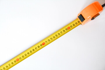 Tape measure isolated on white background with clipping path and copy space.