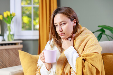 Young woman suffering from cold