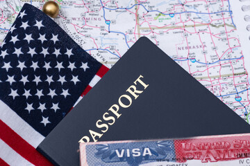 Passport with a US Visa against the background of the flag and map of the United States. The concept of travel and freedom of movement.