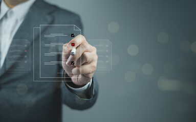 A professional in a suit is interacting with a digital interface, highlighting data entry or analysis through virtual touchscreen technology.