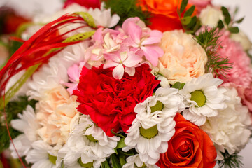 beautiful bouquet of different flowers in vase, closeup.