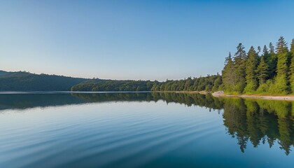 Obraz premium Tranquil Waters Mirroring the Bright Blue Sky