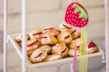 Homemade cookies with jam on a stand in the form of a heart
