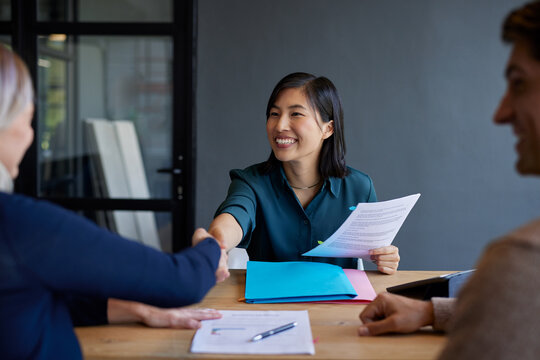 Businesswoman shaking hand after meeting