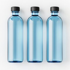 Naklejka premium Three transparent blue plastic bottles with black caps arranged in a row on a white background.