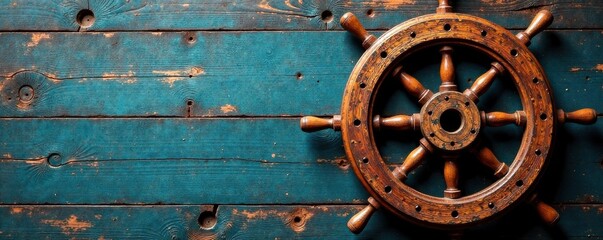 Obraz premium Distressed wooden ship wheel, sailing, rope, ship