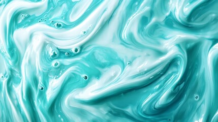 Obraz premium Teal melted milk swirl on white background. Sour cream or yogurt swirl texture