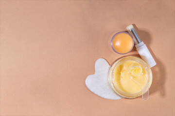 Tallow cream, serum and facial skin care products in sticks. Trendy cream based on animal fat,...
