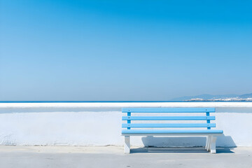 Serene Seascape, Blue Bench by White Wall, Offers Tranquil Coastal View Under a Clear Sky