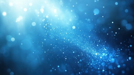 Naklejka premium A mesmerizing blue background with shimmering particles, creating a dreamy atmosphere. Ideal for use in design, digital art, or relaxation themes.