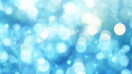 Obraz premium A mesmerizing blur of blue shades with shimmering bokeh effects, ideal for backgrounds, design elements, and creative projects. Bring calm and serenity.