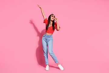 Full body portrait of nice young lady dancing wear top isolated on pink color background