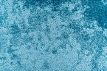 Texture of dense blue fabric for tailoring. Canvas. Textile. Material. Velour