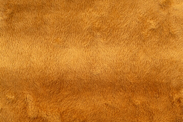 Texture of dense brown fabric for tailoring. Canvas. Textile. Material. Velour